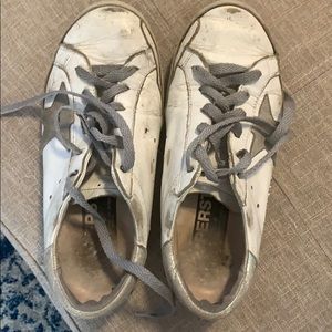 Golden goose. Very loved. Come with dust bag.